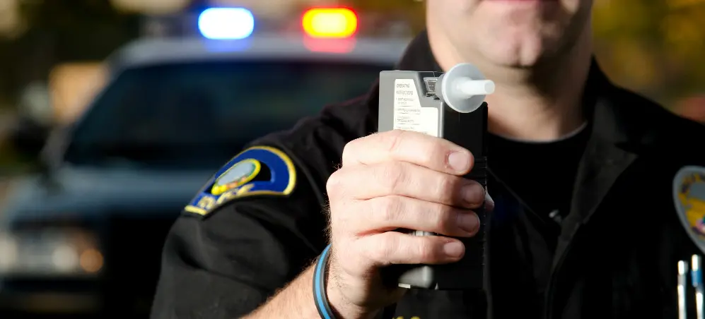 Police Officer With DUI Breathlyzer