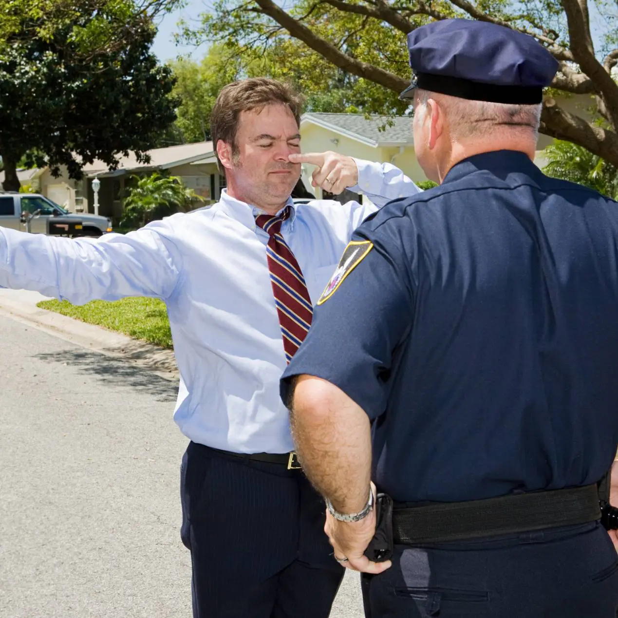 man taking field sobriety test